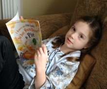 A girl relaxes while reading