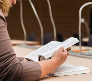 open book on library table