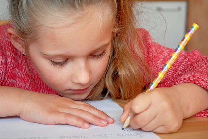 young girl with pencil