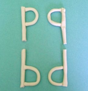 clay letters p q b d