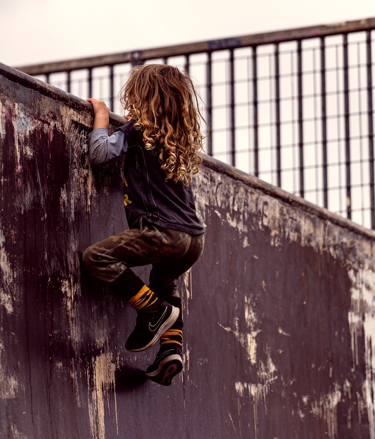 child climbing wall