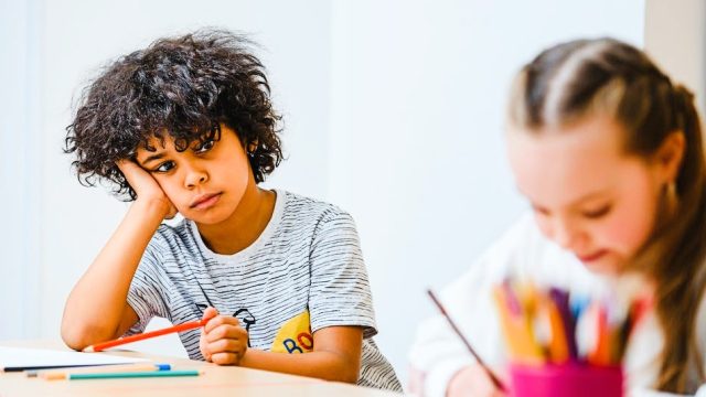 Boy at a Desk
